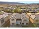 This aerial view highlights this gorgeous two-story home and the surrounding community at 88 Pristine Glen St, Las Vegas, NV 89135
