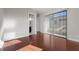 Bedroom with hardwood floors and natural light coming through sliding glass door at 88 Pristine Glen St, Las Vegas, NV 89135
