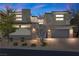 Modern two-story home featuring a two-car garage and neutral color scheme at 88 Pristine Glen St, Las Vegas, NV 89135