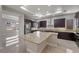 Bright, spacious kitchen features an expansive island, stainless steel appliances, and abundant counter space at 88 Pristine Glen St, Las Vegas, NV 89135