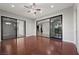Open living room featuring hardwood floors, sliding glass doors, and plenty of natural light at 88 Pristine Glen St, Las Vegas, NV 89135
