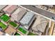 This aerial view captures the house's gray roof, two-car garage and desert landscaping at 8866 Mountain Lion Ave, Las Vegas, NV 89166