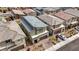 This aerial view captures the house's gray roof, two-car garage and desert landscaping at 8866 Mountain Lion Ave, Las Vegas, NV 89166