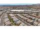 Overhead view of a well-planned community close to shopping centers and amenities, promoting convenience at 8866 Mountain Lion Ave, Las Vegas, NV 89166