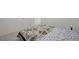Bedroom with carpet, neutral paint, and patterned duvet cover at 8866 Mountain Lion Ave, Las Vegas, NV 89166