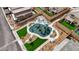 Aerial view of a well-maintained community playground with modern equipment and manicured landscaping at 8866 Mountain Lion Ave, Las Vegas, NV 89166