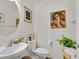 Charming half-bathroom with stylish fixtures and unique decor at 8868 Intertwine, Las Vegas, NV 89149