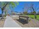 The South Commons community park with a basketball court and seating area, providing recreational opportunities for all residents at 8868 Intertwine, Las Vegas, NV 89149