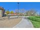 The North Commons community park entrance with pathway and lush landscaping, a welcoming outdoor space for residents at 8868 Intertwine, Las Vegas, NV 89149