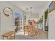 Bright dining area with a round table, natural light, and access to the outdoor patio at 8868 Intertwine, Las Vegas, NV 89149