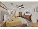 Relaxing main bedroom with large bed, ceiling fan, and ample storage at 8868 Intertwine, Las Vegas, NV 89149