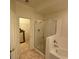 Angle view of a full bathroom featuring tiled shower, soaking tub, and vanity at 9126 Haddington Ln, Las Vegas, NV 89145