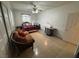 Bright bedroom featuring tile flooring and a ceiling fan at 9126 Haddington Ln, Las Vegas, NV 89145