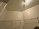 Walk-in closet with custom shelving at 9126 Haddington Ln, Las Vegas, NV 89145