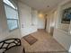 Inviting foyer with tile flooring and ample natural light creating a warm and welcoming entrance at 9126 Haddington Ln, Las Vegas, NV 89145