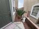 Entrance featuring a well-maintained flower bed, a welcoming front door, and a lovely, decorative mat at 9126 Haddington Ln, Las Vegas, NV 89145