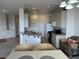 Open kitchen with a breakfast bar and modern appliances offer a functional yet stylish space at 9126 Haddington Ln, Las Vegas, NV 89145