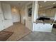 Bright kitchen with neutral-toned cabinets and granite countertops offers a practical yet stylish space at 9126 Haddington Ln, Las Vegas, NV 89145