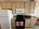 Traditional kitchen features neutral cabinets and granite countertops at 9126 Haddington Ln, Las Vegas, NV 89145