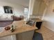 Spacious living area featuring a granite counter and TV at 9126 Haddington Ln, Las Vegas, NV 89145