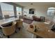 Bright living room and dining area with large windows for natural light at 9126 Haddington Ln, Las Vegas, NV 89145