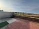 Private patio with brick flooring and a partial desert view at 9126 Haddington Ln, Las Vegas, NV 89145