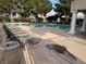 A pristine pool surrounded by comfortable lounge chairs invites relaxation and leisure at 9126 Haddington Ln, Las Vegas, NV 89145
