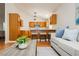 The kitchen includes an island counter, hardwood floors, and stylish pendant lighting at 9741 Horizon Hills Dr, Las Vegas, NV 89117