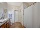 Bathroom featuring a sink and a shower with a bright interior at 980 Aspen Cliff Dr, Henderson, NV 89011