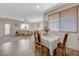 Comfortable living area featuring a ceiling fan and window views at 980 Aspen Cliff Dr, Henderson, NV 89011