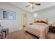 Spacious main bedroom featuring double bed, ensuite bathroom and neutral walls at 980 Aspen Cliff Dr, Henderson, NV 89011