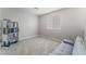 Bright bonus room with carpet, natural light, and versatile space at 7940 Violet Dawn St, Las Vegas, NV 89149