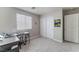 Home office offers natural light and storage at 7940 Violet Dawn St, Las Vegas, NV 89149