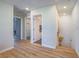 Upstairs hallway featuring doors to the bedrooms and bathroom at 10768 Ditchburn Ct, Las Vegas, NV 89166