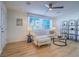 Cozy living room with ample natural light, comfortable seating, and contemporary decor for relaxed living at 10768 Ditchburn Ct, Las Vegas, NV 89166
