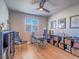 Comfortable office featuring hardwood floors, plenty of natural light, and a dedicated workspace at 10768 Ditchburn Ct, Las Vegas, NV 89166
