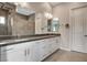 Modern bathroom featuring double sink vanity with sleek hardware at 10985 Limeslice Ave # 2, Las Vegas, NV 89135