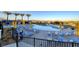 Inviting community pool area with lounge chairs, umbrellas, and mountain views at 10985 Limeslice Ave # 2, Las Vegas, NV 89135