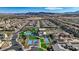 Active adult community featuring a pool, and tennis courts, surrounded by modern homes and desert landscape at 10985 Limeslice Ave # 2, Las Vegas, NV 89135