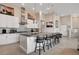 Spacious kitchen with a large island, modern appliances, and stylish pendant lighting at 10985 Limeslice Ave # 2, Las Vegas, NV 89135