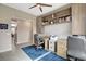 Bright home office featuring custom built-ins, desk, and neutral tones throughout at 10985 Limeslice Ave # 2, Las Vegas, NV 89135