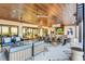 Expansive outdoor patio with comfortable seating, elegant dining, and stylish ceiling fans at 10985 Limeslice Ave # 2, Las Vegas, NV 89135