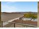 Expansive view from the balcony overlooking a scenic landscape and clear skies at 10985 Limeslice Ave # 2, Las Vegas, NV 89135