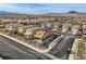 Aerial view of a modern home with a backyard pool, set in a well-maintained suburban neighborhood at 117 Blue Trout Ave, Henderson, NV 89011