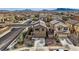 Aerial view of a residential property showcasing its landscaped yard and neighborhood setting at 117 Blue Trout Ave, Henderson, NV 89011