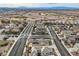 Residential neighborhood with tidy streets and desert scenery, showcasing neat landscaping and diverse home styles at 117 Blue Trout Ave, Henderson, NV 89011