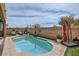 Sparkling pool with ample lounge space and decorative landscaping, perfect for summer days at 117 Blue Trout Ave, Henderson, NV 89011