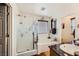 Bathroom featuring a shower with glass doors, soaking tub, and a vanity at 117 Blue Trout Ave, Henderson, NV 89011