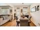 Comfortable dining area with hardwood floors, perfect for Gathering gatherings and entertaining at 117 Blue Trout Ave, Henderson, NV 89011