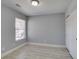 Bright bedroom features wood-look flooring, closet, and natural light from the window at 1334 Shimmering Glen Ave, Henderson, NV 89014